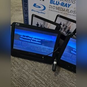 Sylvania 10.1" Dual Screen Portable Car Blu-Ray (R) DVD Media Player SDVD1087